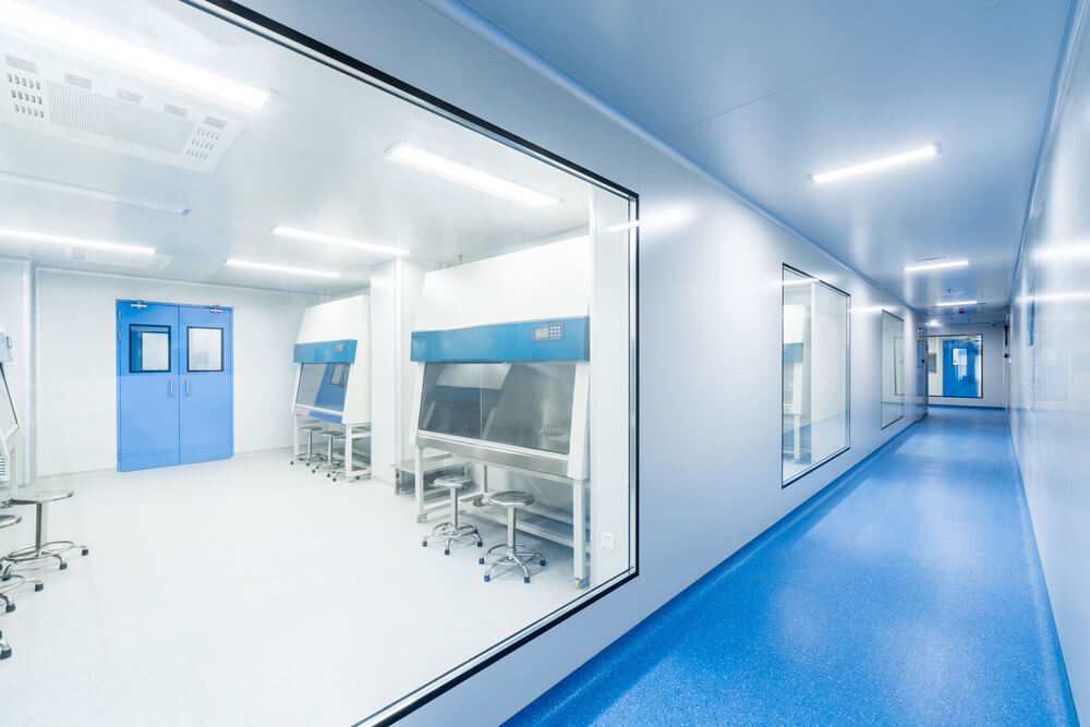 Specialist conducting air quality tests for cleanroom qualification