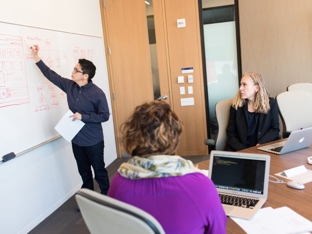 Team of employees receiving training in a modern facility